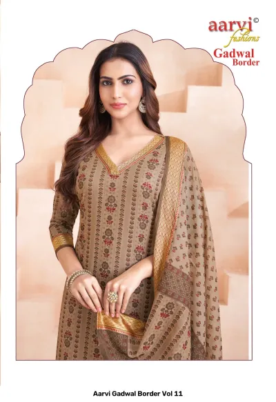 Aarvi Gadwal Border Vol 11 beige printed salwar suit with zari border and matching dupatta.