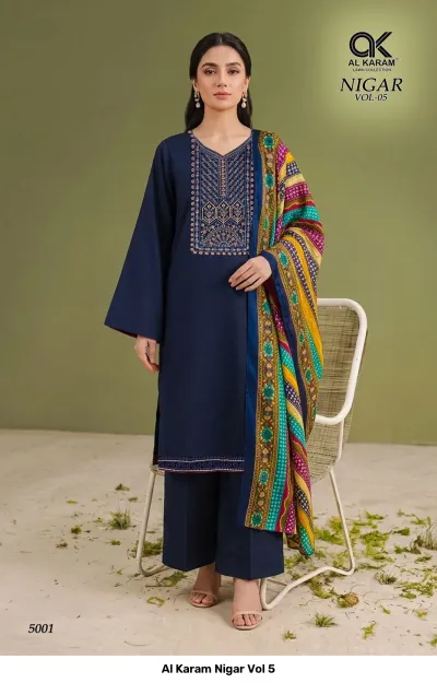 Al Karam Nigar Vol 5, navy blue salwar suit featuring a plain kurti with embroidery on the neck and a colorful patterned dupatta.