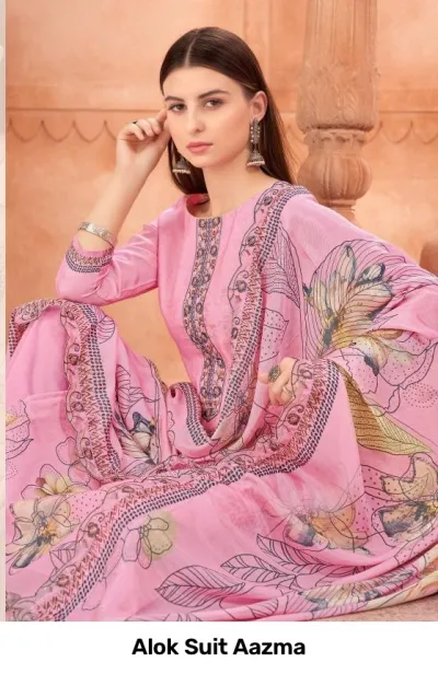 Alok Suit Aazma: Model wearing a pink salwar suit with floral prints, thread work neckline embroidery, and a coordinating floral dupatta.