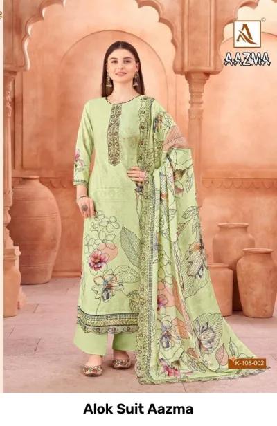 Alok Suit Aazma: Model wearing a light green salwar suit with floral prints, thread work embroidery, and a matching printed dupatta.