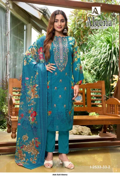 Alok Suit Aleena: Teal salwar suit with floral print and detailed thread work embellishments, paired with a matching floral dupatta.