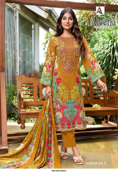 Alok Suit Aleena: Mustard yellow salwar suit with floral prints, thread embroidery on the chest, and a coordinating floral dupatta.