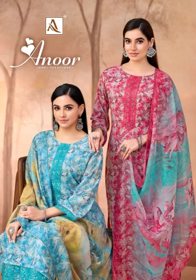 Alok Suit Anoor catalog cover showing two models wearing pink and blue printed floral salwar suits with matching dupattas.