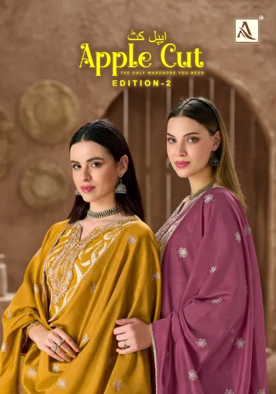 Alok Suit Apple Cut Edition 2 catalog cover showing two women in mustard and purple salwar suits with embroidery.