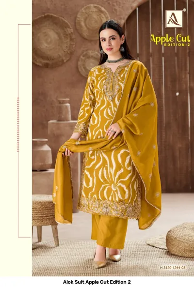 Alok Suit Apple Cut Edition 2 mustard yellow salwar suit with abstract wavy print, embroidery at neck and hem.