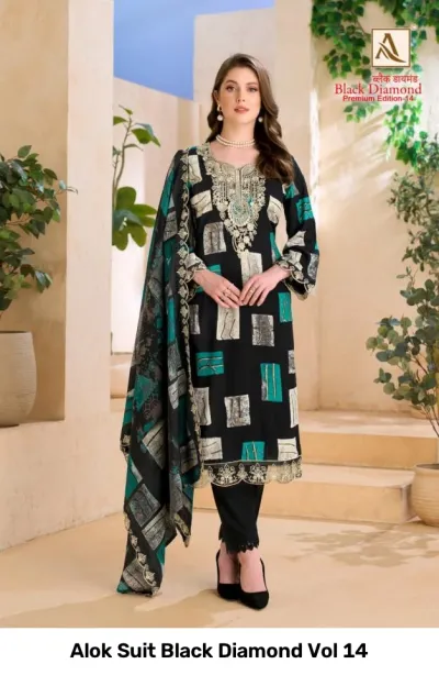 Alok Suit Black Diamond Vol 14: Model wearing black and teal printed salwar suit with heavy zari and thread work embroidery.