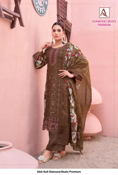 Alok Suit Diamond Beats Premium: Brown salwar suit featuring floral print dupatta, thread work, and zari embroidery detailing.