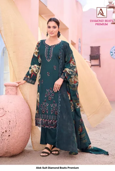 Alok Suit Diamond Beats Premium: Dark green salwar suit with floral print dupatta and detailed thread work embroidery.