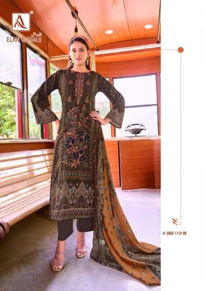 Alok Suit Elan Royale: Model wearing a dark brown printed straight-cut salwar suit with floral thread work and a mustard yellow printed dupatta.