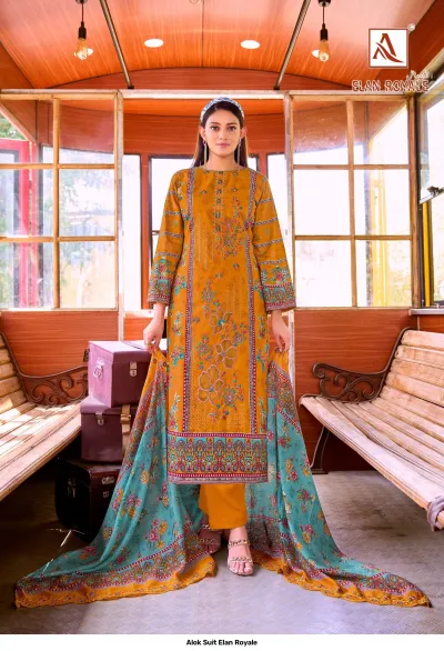 Alok Suit Elan Royale: Model wearing a mustard yellow printed straight-cut salwar suit with floral thread work and a turquoise patterned dupatta.
