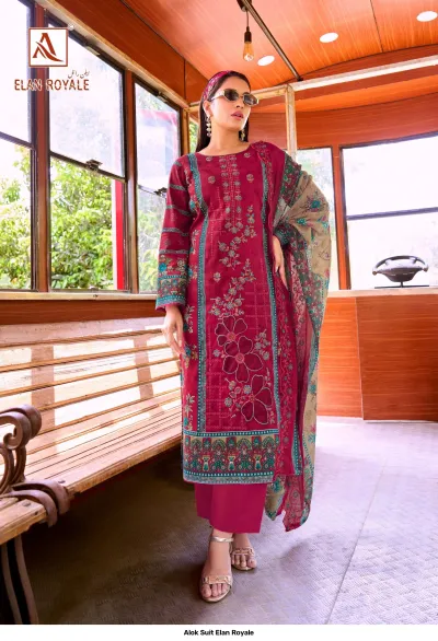 Alok Suit Elan Royale: Model wearing a maroon printed straight-cut salwar suit featuring floral thread work and a beige floral dupatta.