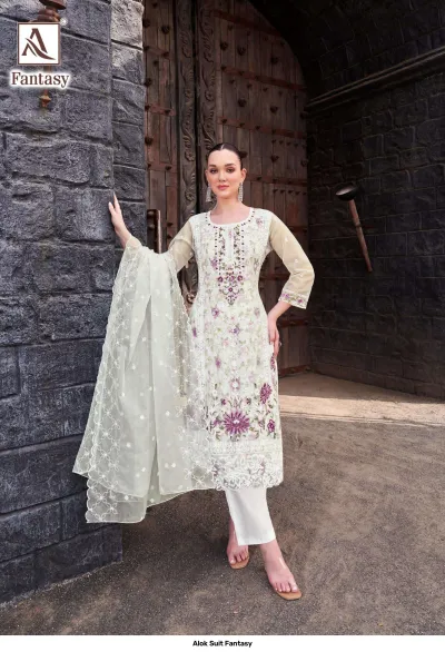 Alok Suit Fantasy: Light cream salwar suit adorned with purple and white floral thread work embroidery and matching pants.