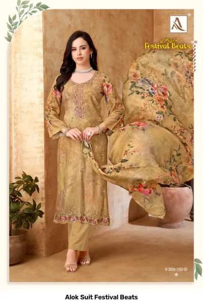 Alok Suit Festival Beats: Golden-brown salwar suit with floral printed dupatta and intricate zari and thread work embroidery.