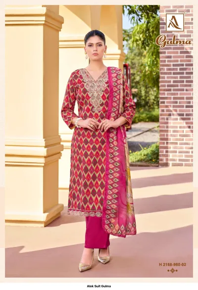 Alok Suit Gulma: A pink and green printed salwar suit with zari work embroidery on the neckline and a matching printed dupatta.