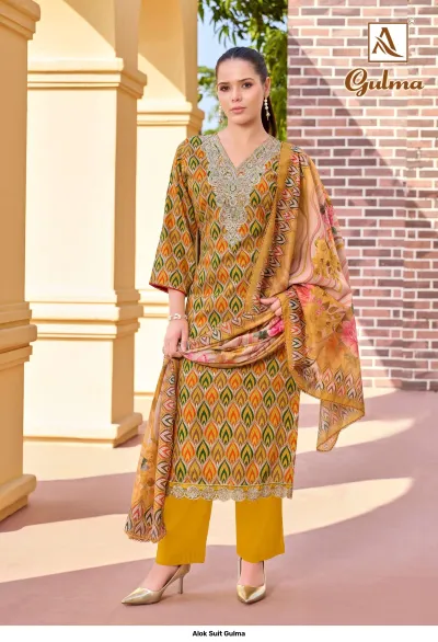 Alok Suit Gulma: A yellow and orange printed salwar suit with zari work embroidery on the neckline and a matching printed dupatta.