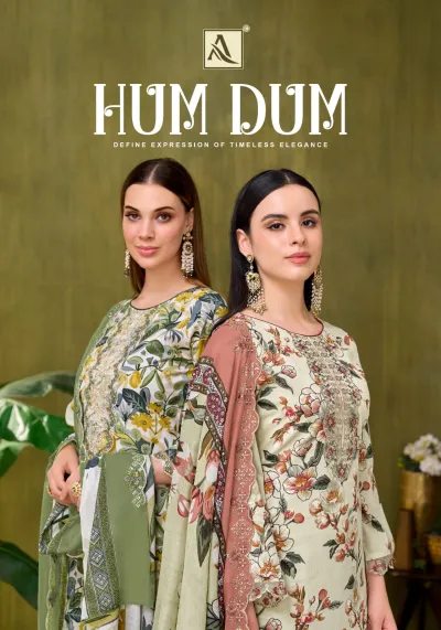 Alok Suit Hum Dum catalog cover featuring models in floral printed salwar suits with intricate thread and zari work.