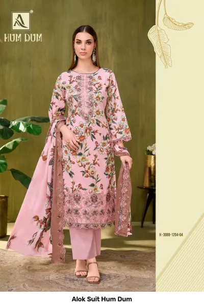 Alok Suit Hum Dum, light pink floral printed salwar suit with thread and zari work embellishments on the kurta hem.