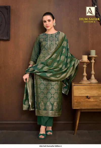 Alok Suit Humsafar Edition 6: Green salwar suit with gold zari work, featuring a straight-cut kurti, matching pants, and a coordinated printed dupatta.