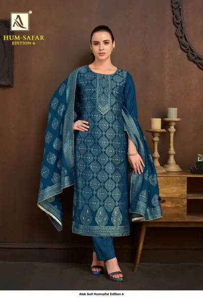 Alok Suit Humsafar Edition 6: Deep blue salwar suit with gold zari work, straight-cut kurti, matching pants, and a coordinated printed dupatta.