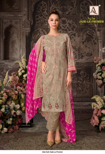 Alok Suit Jade Le Premier: Beige salwar suit with floral thread work, embroidery, and a vibrant pink printed dupatta.