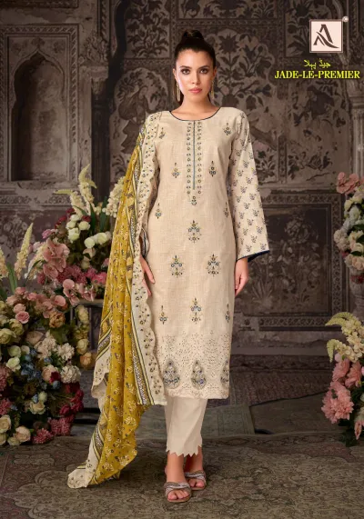 Alok Suit Jade Le Premier: Beige salwar suit featuring floral thread work, embroidery, and a mustard yellow printed dupatta.