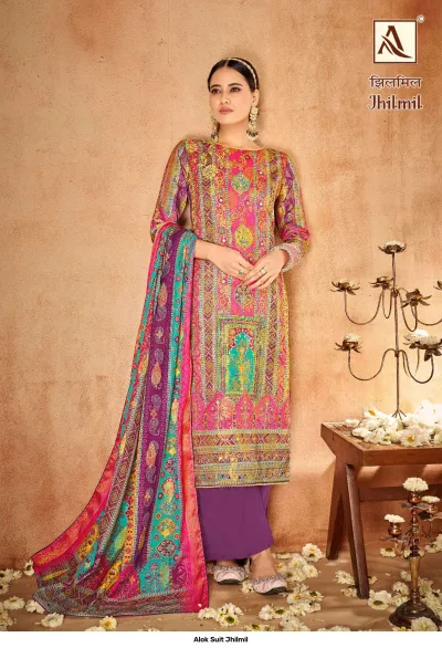 Alok Suit Jhilmil: A purple and multi-colored printed salwar suit with elaborate patterns and a coordinating dupatta.