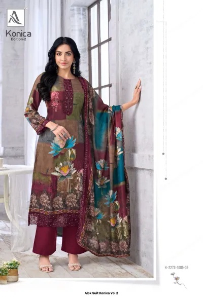 Alok Suit Konica Vol 2 multicolor patch-style printed salwar suit with floral motifs and thread work, paired with a dupatta.