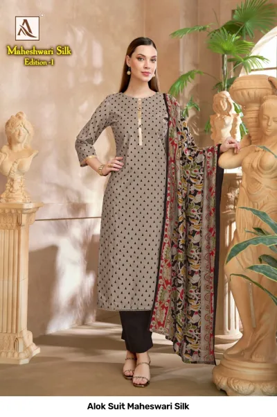 Alok Suit Maheswari Silk: A grey kurti with black triangle patterns, black pants, and a black floral printed dupatta.