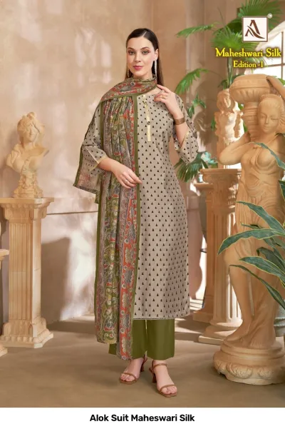 Alok Suit Maheswari Silk: A grey kurti with black triangle patterns, olive green pants, and an olive floral printed dupatta.