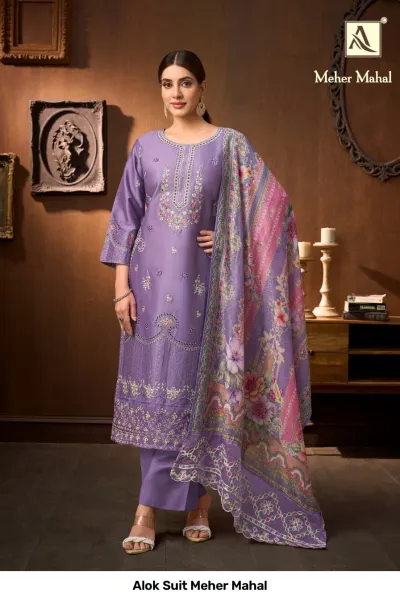 Alok Suit Meher Mahal: Lilac salwar suit with detailed thread work embroidery, straight cut silhouette, and a matching floral printed dupatta.