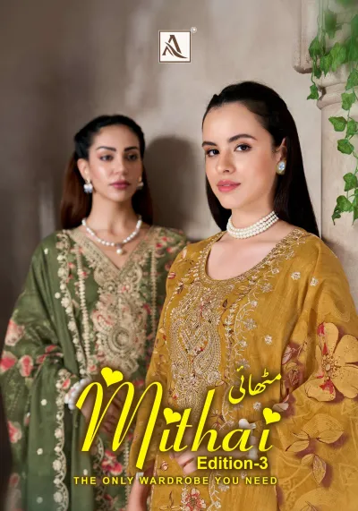 Alok Suit Mithai Vol 3, catalog cover showing two women in green and mustard printed salwar suits with zari embroidery work.