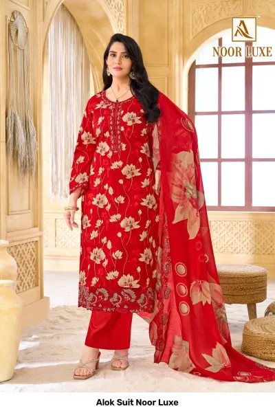 Alok Suit Noor Luxe: Red salwar suit with floral print, featuring intricate zari and thread work embroidery on the neckline and hemline.