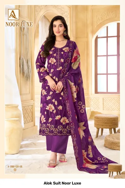 Alok Suit Noor Luxe: Purple salwar suit with floral print, featuring intricate zari and thread work embroidery on the neckline and hemline.