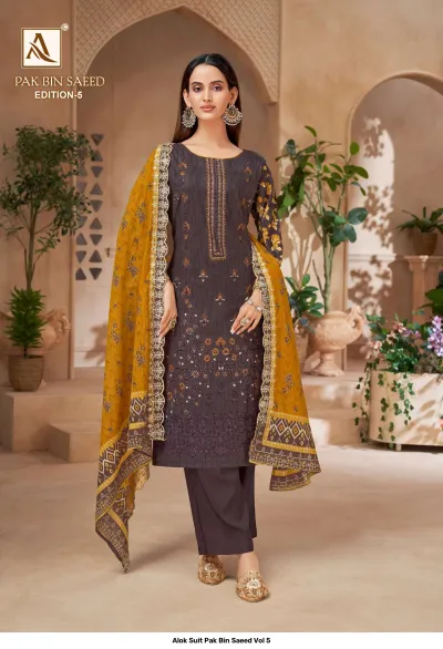 Alok Suit Pak Bin Saeed Vol 5 charcoal grey printed straight cut salwar suit with thread work and a mustard contrast dupatta.
