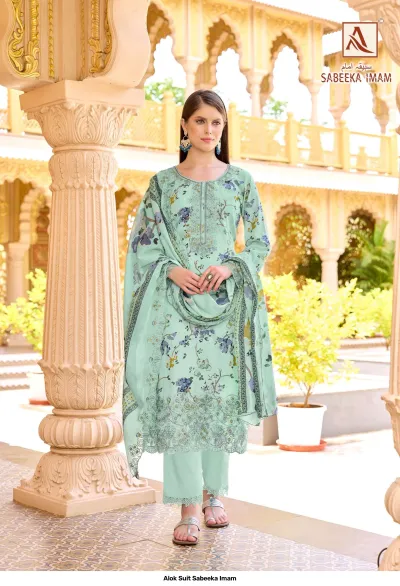 Alok Suit Sabeeka Imam: Mint green floral print salwar suit with intricate hem embroidery and a matching dupatta.
