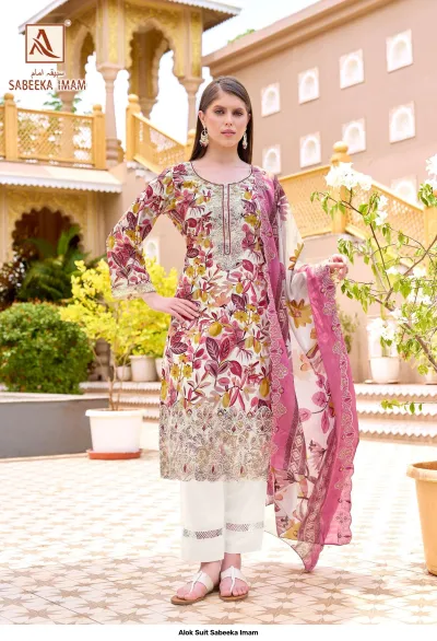 Alok Suit Sabeeka Imam: Cream-based floral print salwar suit with multi-colored pattern and detailed hem embroidery.