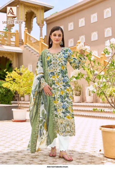 Alok Suit Sabeeka Imam: Cream-based floral and fruit print salwar suit with detailed hem embroidery and green dupatta.
