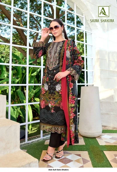 Alok Suit Saira Shakira, black salwar suit with vibrant floral print, red border on the dupatta, and detailed thread work embellishment.