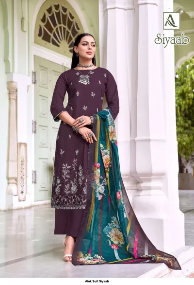 Alok Suit Siyaab: Purple salwar suit with thread work embroidery and a teal-based floral printed dupatta.
