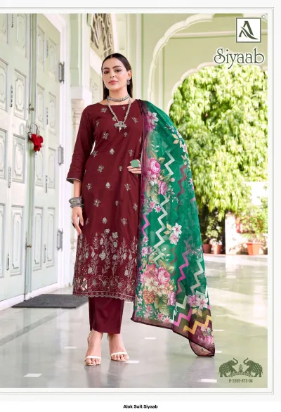 Alok Suit Siyaab: Maroon salwar suit with thread work embroidery and a green-based floral printed dupatta.