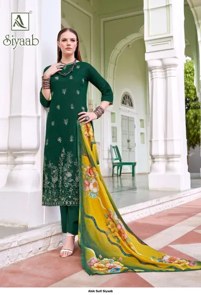 Alok Suit Siyaab: Green salwar suit with thread work embroidery and a yellow-toned floral printed dupatta.