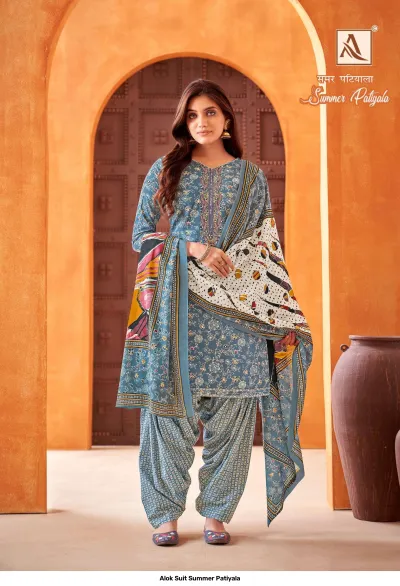 Alok Suit Summer Patiyala blue salwar suit with floral print, neckline embroidery, and a patterned dupatta.