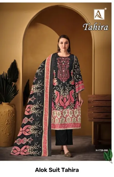 Alok Suit Tahira: Black and pink printed salwar suit with paisley motifs and embroidery on the chest.