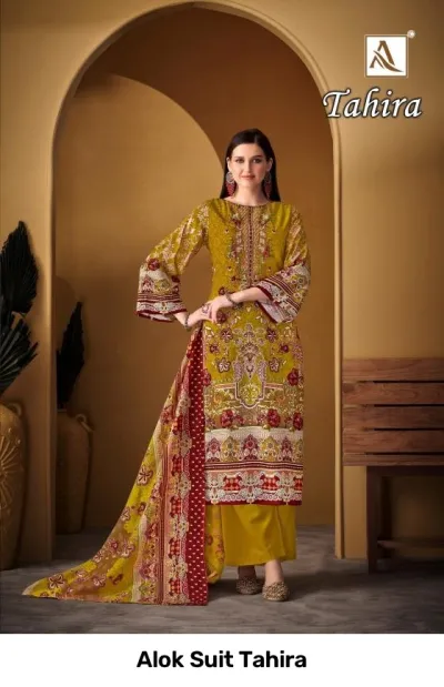 Alok Suit Tahira: Mustard yellow printed salwar suit with floral patterns and matching dupatta.