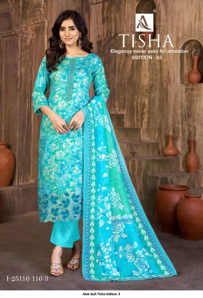 Alok Suit Tisha Edition 3: Model wearing a blue floral printed salwar suit with embroidered hem and matching dupatta.