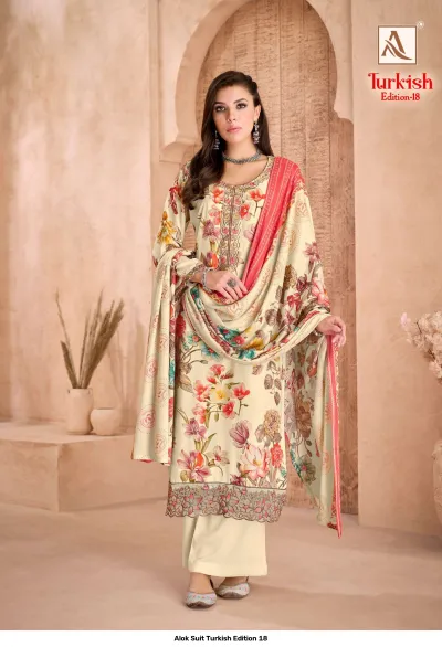 Alok Suit Turkish Edition 18: Cream colored floral printed salwar suit with thread and zari work embroidery on the neckline and hem.