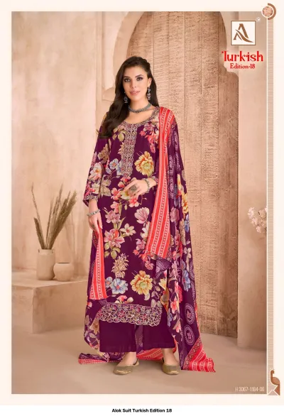 Alok Suit Turkish Edition 18: Deep purple floral printed salwar suit with thread and zari work embroidery on the neckline and bottom hem.