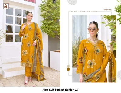 Alok Suit Turkish Edition 19: Mustard yellow salwar suit featuring large floral print, V-neckline, thread work, and a matching patterned dupatta.