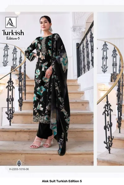 Alok Suit Turkish Edition 5: Model wearing a black salwar suit with a teal floral print, thread work embroidery, and matching dupatta.