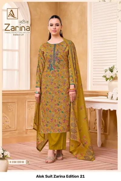 Alok Suit Zarina Edition 21, mustard-yellow printed salwar suit featuring detailed floral patterns and thread work.